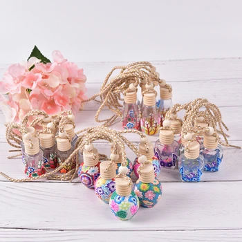 Cute Glass Perfume Bottle 12ml Polymer Clay Vials for Essential Oil Car Decoration Fragrance Bottle Charming Pendant Decoration
Cute Glass Perfume Bottle 12ml Polymer Clay Vials for Essential Oil Car Decoration Fragrance Bottle Charming Pendant Decoration