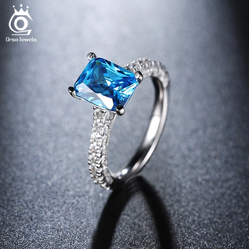 ORSA JEWELS Lady Luxury Crystal Wedding Ring With Ocean Square Cut Blue AAA CZ For Women Anniversary Party Ring Jewelry AOR139
ORSA JEWELS Lady Luxury Crystal Wedding Ring With Ocean Square Cut Blue AAA CZ For Women Anniversary Party Ring Jewelry AOR139