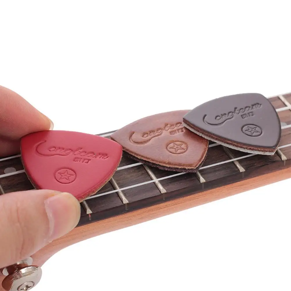 3 Pcs Guitar Picks Pickup Leather Guitar Picks for Ukulele Guitar Banjor Random Color
3 Pcs Guitar Picks Pickup Leather Guitar Picks for Ukulele Guitar Banjor Random Color