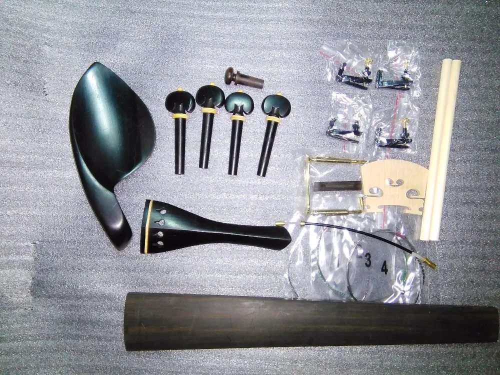 Black Ebony Violin parts 4/4 with Boxwood ring decoration SF05 with string clamp string saddle fingerboard etc all in 4/4
Black Ebony Violin parts 4/4 with Boxwood ring decoration SF05 with string clamp string saddle fingerboard etc all in 4/4