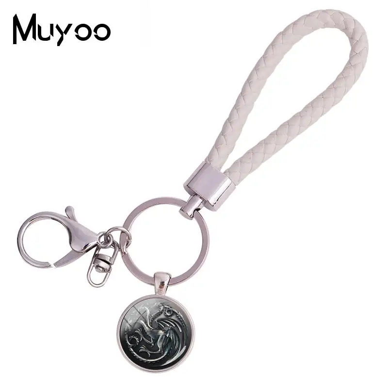 2018 New Game Of Thrones Leather Rope Keyring House Of Stark Targarye Wolf Dragon Keychains Glass Cabochon Jewelry
2018 New Game Of Thrones Leather Rope Keyring House Of Stark Targarye Wolf Dragon Keychains Glass Cabochon Jewelry