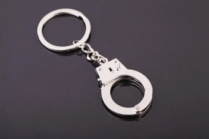 Сувенир-брелок наручники красные Р93а - Подиум - Подарки - Купить