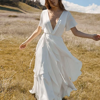Vintage 2019 Summer White Long Dress Elegant Deep V Neck Irregular Ruffles Maxi Dress Vacation Flare Sleeve Retro Vestido Verano
Vintage 2019 Summer White Long Dress Elegant Deep V Neck Irregular Ruffles Maxi Dress Vacation Flare Sleeve Retro Vestido Verano