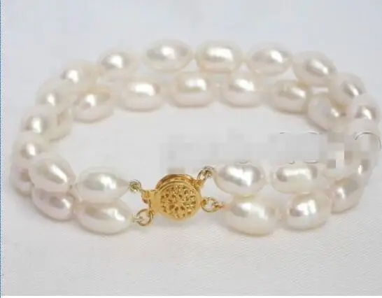 Hot sale new Style >>>>>AAA+ Pretty Gift 2 Rows Genuine White 7-8mm Rice Freshwater Pearl Bracelet 7.5" 
Hot sale new Style >>>>>AAA+ Pretty Gift 2 Rows Genuine White 7-8mm Rice Freshwater Pearl Bracelet 7.5"