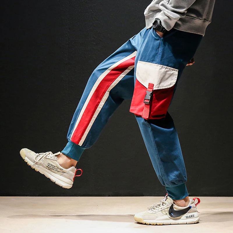 Brand men's trousers hip hop stitching high quality men's harem pants youth big pockets decorative fashion casual sweatpants
Brand men's trousers hip hop stitching high quality men's harem pants youth big pockets decorative fashion casual sweatpants