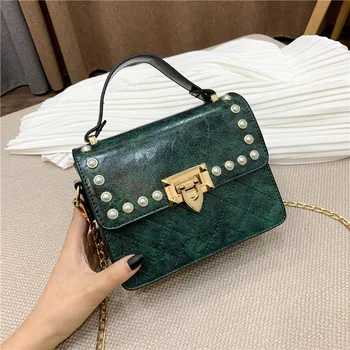 British Fashion Simple Small Square bag Women's Designer Handbag quality PU leather Rivet Tassel Chain Shoulder bags qq181
British Fashion Simple Small Square bag Women's Designer Handbag quality PU leather Rivet Tassel Chain Shoulder bags qq181