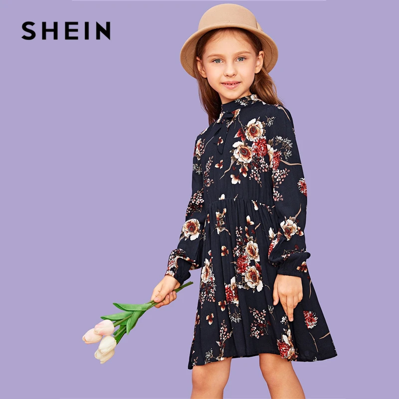 SHEIN Kiddie Navy Stand Collar Floral Print Zipper Bow Casual Dress Girls Clothes 2019 Long Sleeve A Line Beach Kids Short Dress
SHEIN Kiddie Navy Stand Collar Floral Print Zipper Bow Casual Dress Girls Clothes 2019 Long Sleeve A Line Beach Kids Short Dress