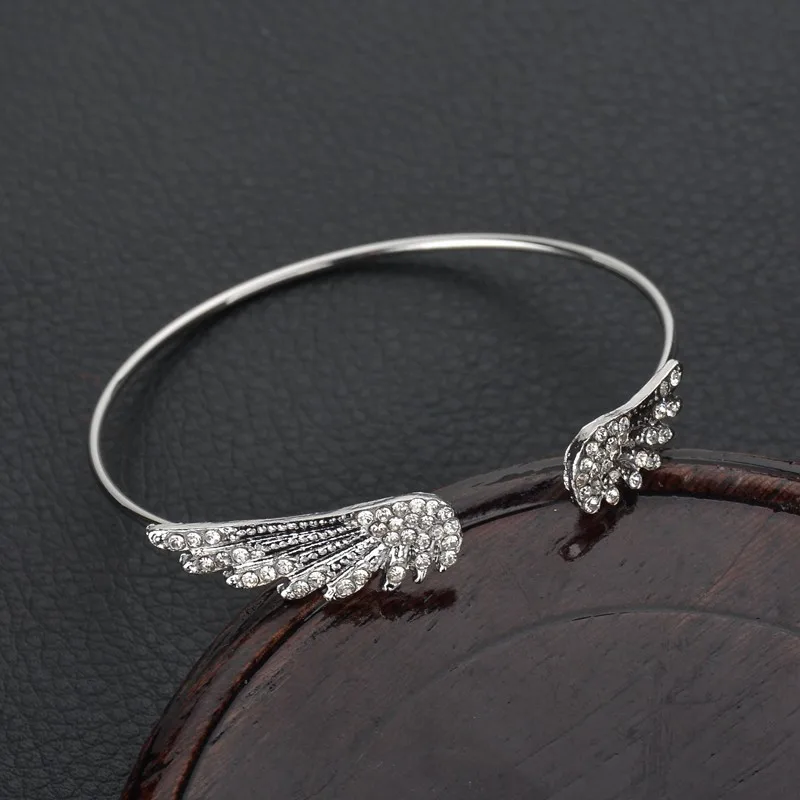ZHIMO Simple Fashion Crystal Wings Chic Lovely Silver Bangles Adjustable Gold Leaf Bracelet Women Girl Charm Valentine's Gifts
ZHIMO Simple Fashion Crystal Wings Chic Lovely Silver Bangles Adjustable Gold Leaf Bracelet Women Girl Charm Valentine's Gifts