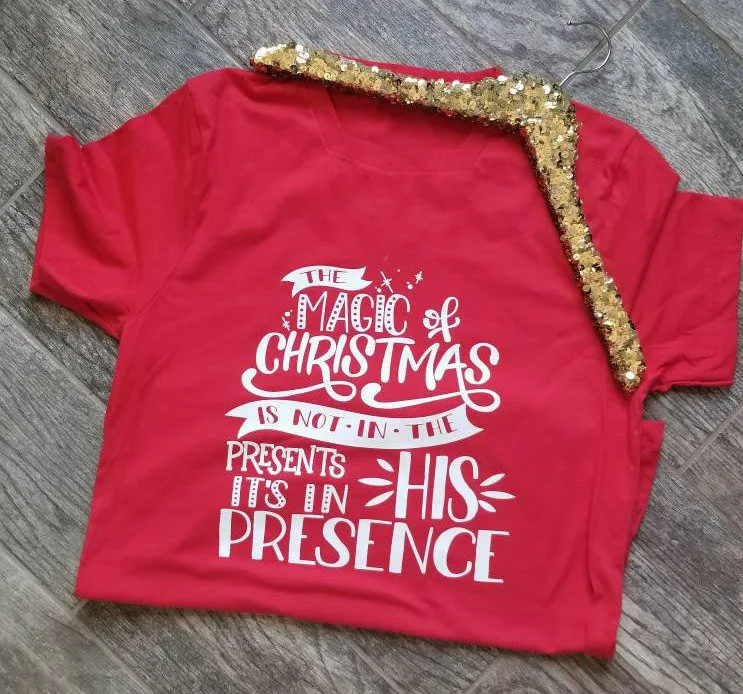 The Magic of Christmas is not in the Presents it's in His Presence Unisex slogan Holiday Shirt Graphic Tee Religious T-Shirt top
The Magic of Christmas is not in the Presents it's in His Presence Unisex slogan Holiday Shirt Graphic Tee Religious T-Shirt top