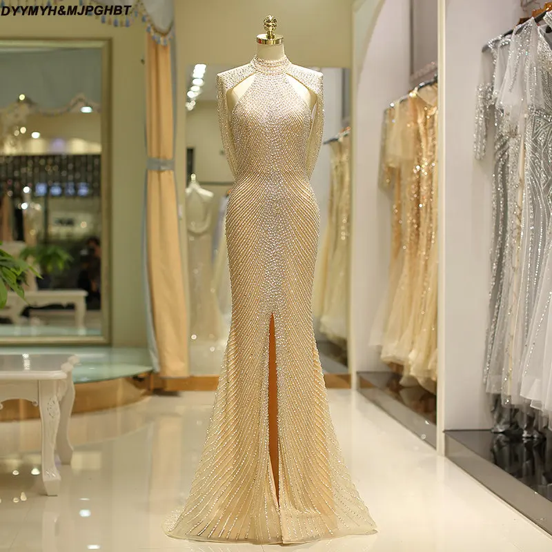 Long Crystal Prom Dresses 2018 Sexy Open Back Halter Blingbling Full Beads Arabic Dubai Evening Gowns
Long Crystal Prom Dresses 2018 Sexy Open Back Halter Blingbling Full Beads Arabic Dubai Evening Gowns