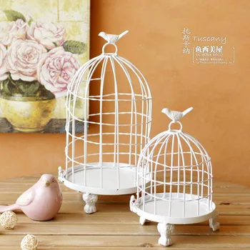 White birdcage candlestick wedding decoration
White birdcage candlestick wedding decoration