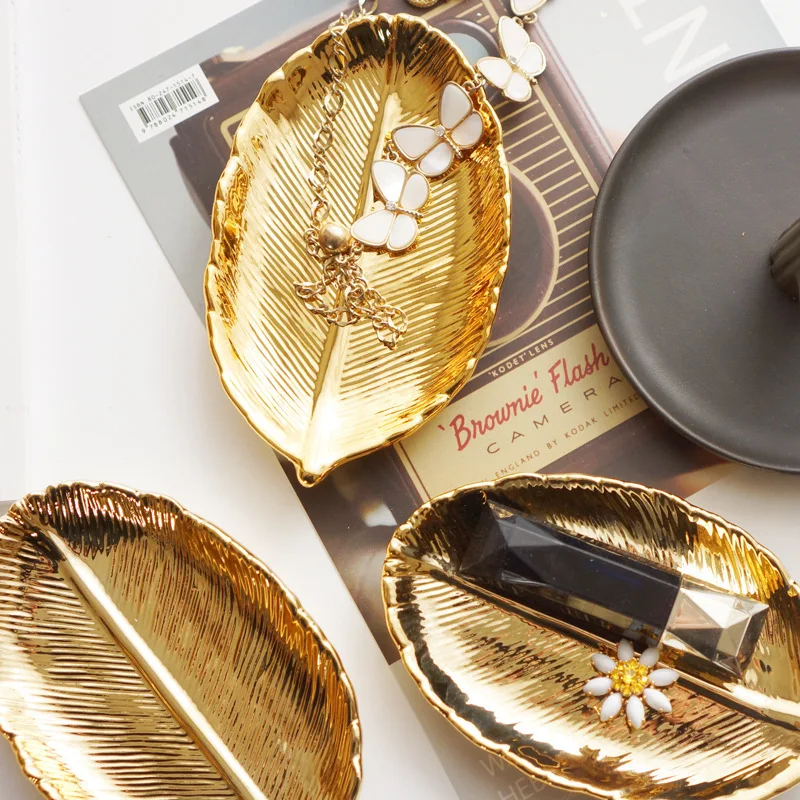 Decorative Gold Leaf Ceramic Plate Dish Porcelain Candy Trinket Dish Jewelry Fruit Serving Tray Storage Plate Crockery Tableware
Decorative Gold Leaf Ceramic Plate Dish Porcelain Candy Trinket Dish Jewelry Fruit Serving Tray Storage Plate Crockery Tableware