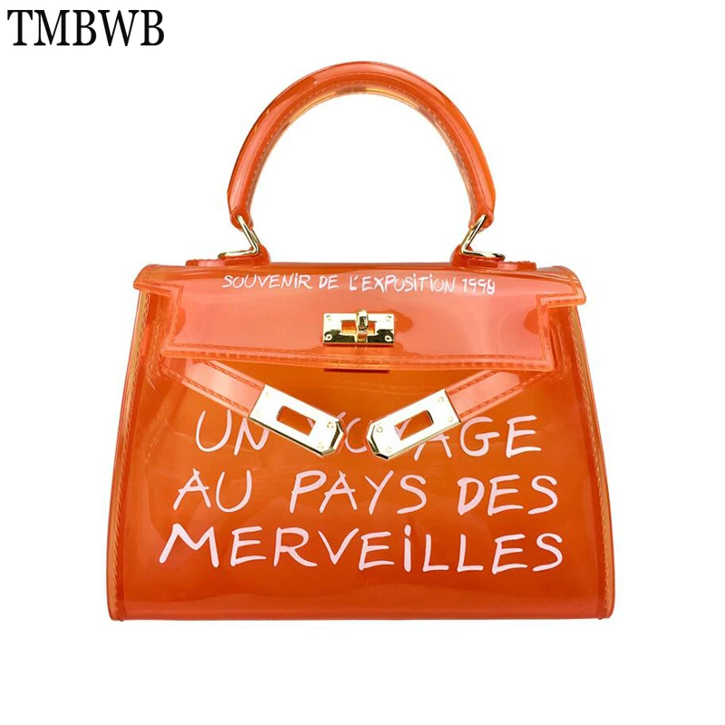 Transparent PVC Shoulder Bags For Women Candy Color Tote Women Jelly Bags Hasp Design Ladies Handbags Trendy Crossbody Bag Q0256
Transparent PVC Shoulder Bags For Women Candy Color Tote Women Jelly Bags Hasp Design Ladies Handbags Trendy Crossbody Bag Q0256