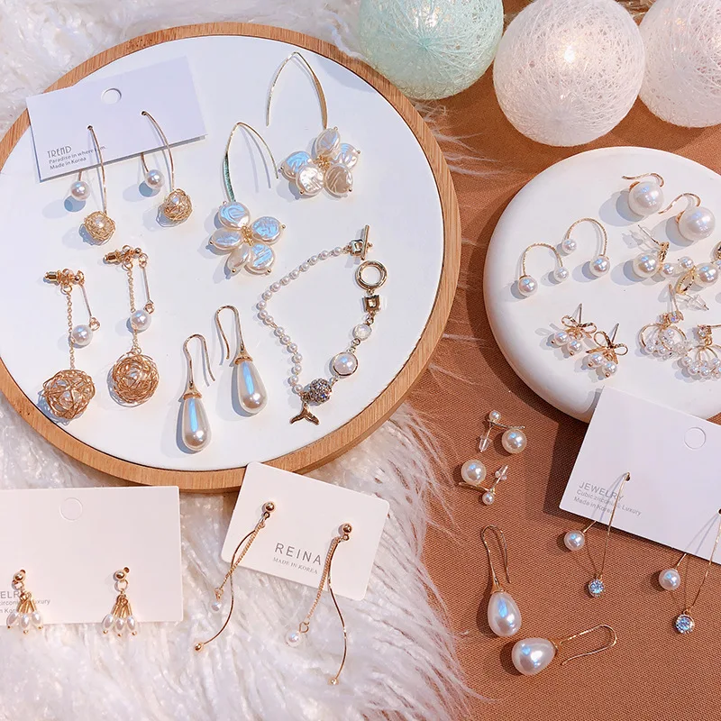 2019 Fashion Personality Wild Earrings Simple Creative Pearl Pendant Earrings New Jewelry
2019 Fashion Personality Wild Earrings Simple Creative Pearl Pendant Earrings New Jewelry