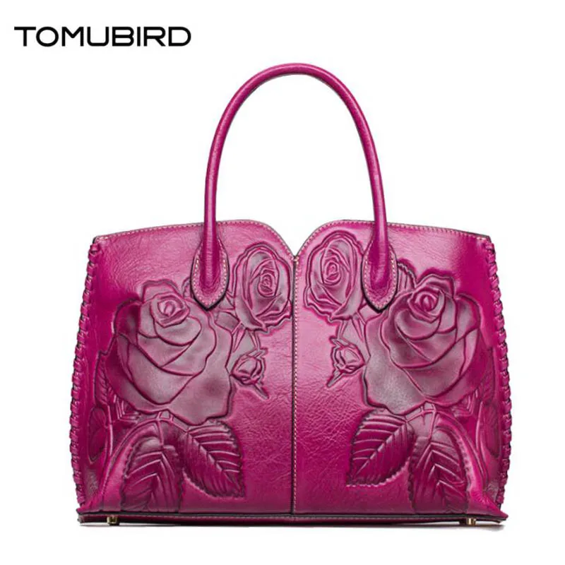 TOMUBIRD New women genuine leather bag fashion National wind embossing Flower art bag women real leather handbags shoulder bag
TOMUBIRD New women genuine leather bag fashion National wind embossing Flower art bag women real leather handbags shoulder bag
