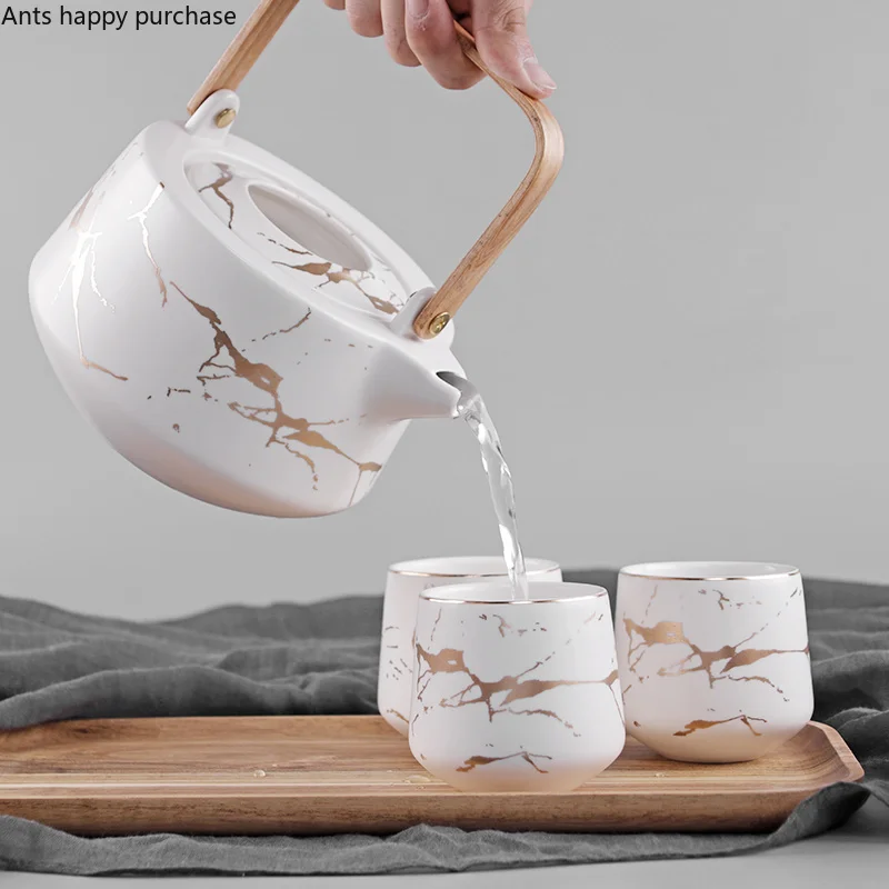 Ceramics Marble Tea Set Teapot Cup Five-piece Suit Log Tray kitchen accessories home decoration accessories room decoration
Ceramics Marble Tea Set Teapot Cup Five-piece Suit Log Tray kitchen accessories home decoration accessories room decoration