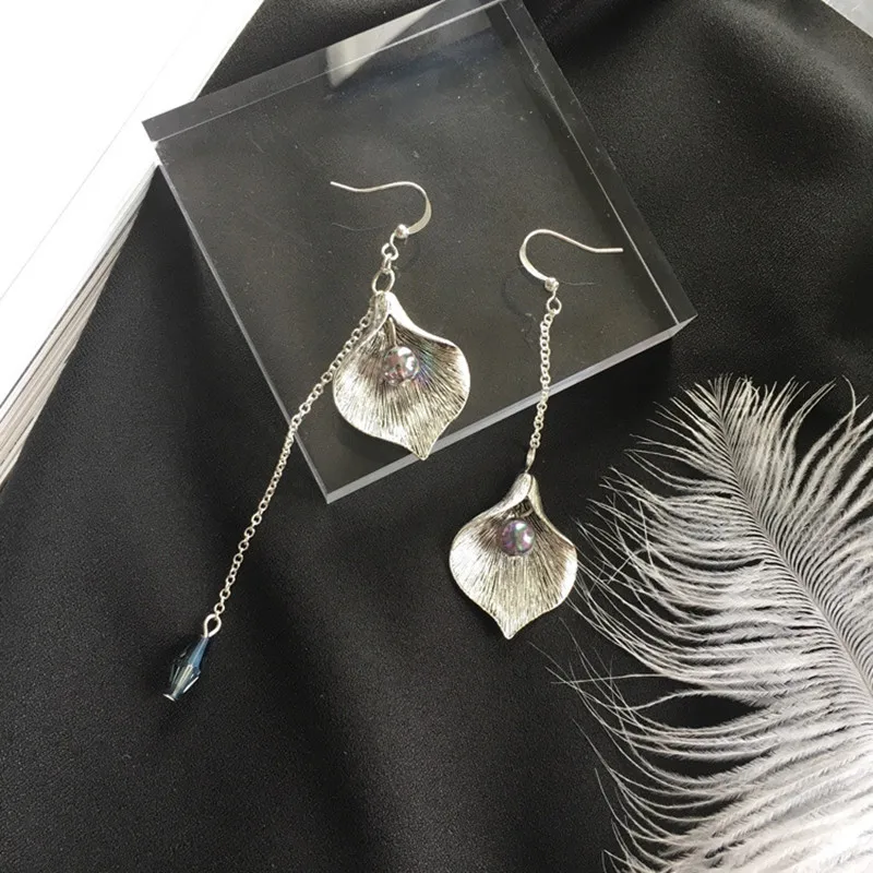 Hot Sell Personality fashion Retro temperament wildflowers irregular petals asymmetric tassel female earrings jewelry 002
Hot Sell Personality fashion Retro temperament wildflowers irregular petals asymmetric tassel female earrings jewelry 002