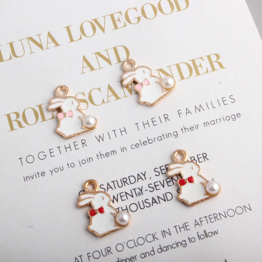 10pcs 15*19MM DIY material enamel pearl bow bunny rabbit charms ornament bracelet pendants for necklace earring jewelry making
10pcs 15*19MM DIY material enamel pearl bow bunny rabbit charms ornament bracelet pendants for necklace earring jewelry making