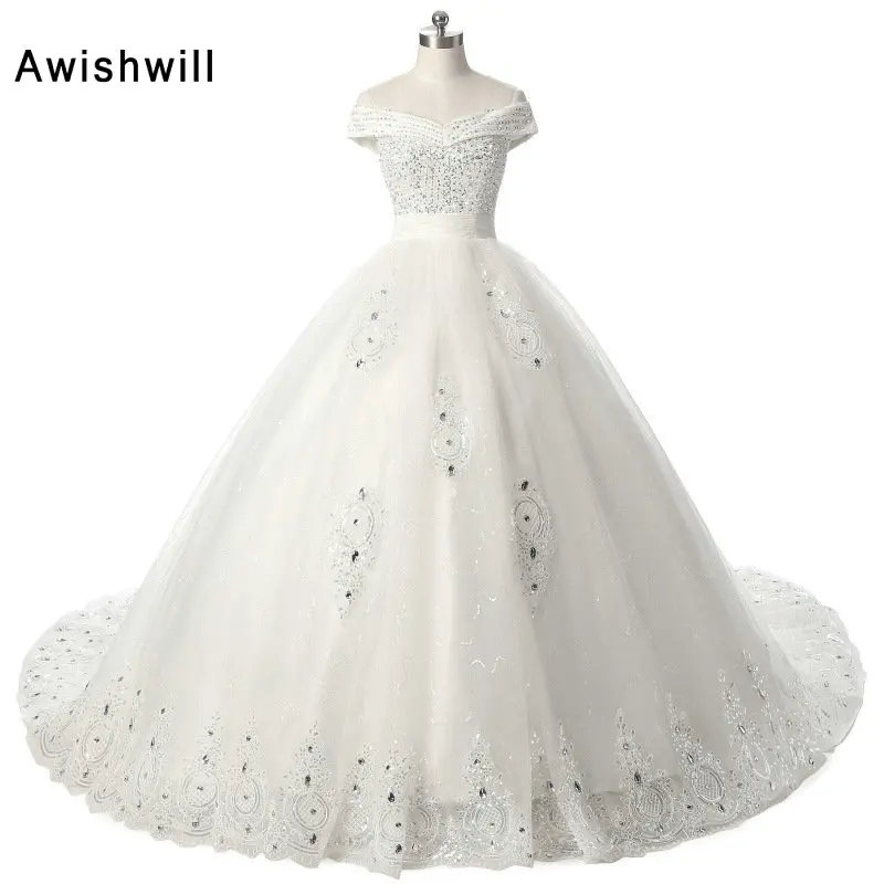 A Line V Neck Off Shoulder Lace up Back Beaded Appliques Tulle Long Tail Wedding Bridal Gown Wedding Dresses Robe de mariee
A Line V Neck Off Shoulder Lace up Back Beaded Appliques Tulle Long Tail Wedding Bridal Gown Wedding Dresses Robe de mariee