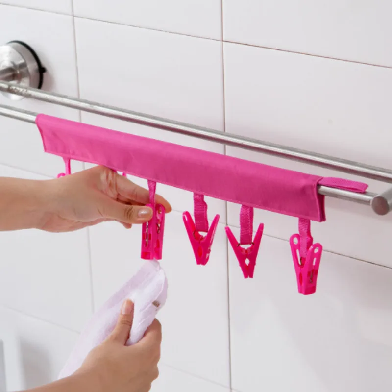 Multifunctional Travel Cloth Hanger Drying Rack Foldable 6 Clip Hanger Towel Socks Hanger Clip Travel Accessories
Multifunctional Travel Cloth Hanger Drying Rack Foldable 6 Clip Hanger Towel Socks Hanger Clip Travel Accessories