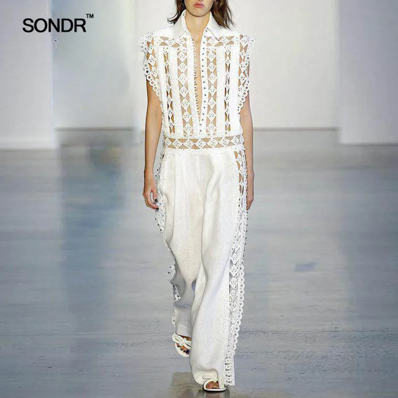 SONDR 2019 Hollow Out Jumpsuits For Women Beading Sleeveless High Waist Wide Leg Pants Female Summer Fashion Leisure New
SONDR 2019 Hollow Out Jumpsuits For Women Beading Sleeveless High Waist Wide Leg Pants Female Summer Fashion Leisure New