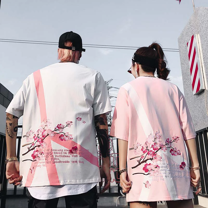 New Anti-war Embroidered Floral Lovers Short-sleeved T-shirts Men and Women Loose Oversize Cotton T Shirt
New Anti-war Embroidered Floral Lovers Short-sleeved T-shirts Men and Women Loose Oversize Cotton T Shirt