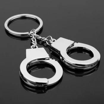 Creative police man Handcuff Keychain Charms Pendant Car Key Keyring Handbag Key Chain Chaveiro
Creative police man Handcuff Keychain Charms Pendant Car Key Keyring Handbag Key Chain Chaveiro