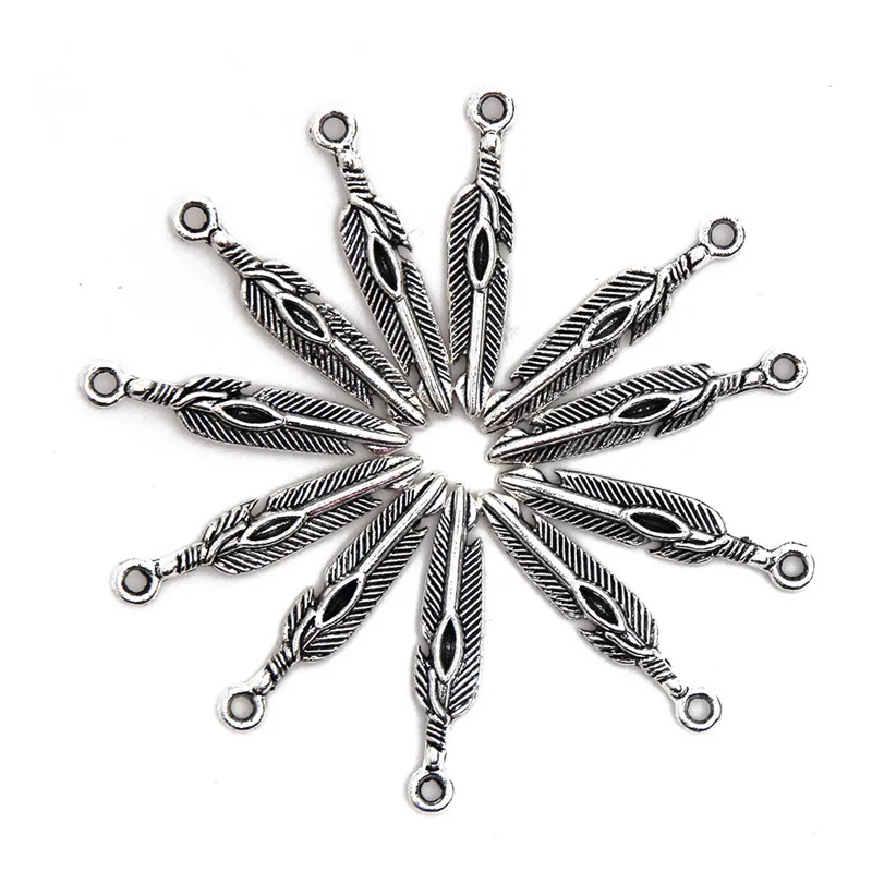 30 pcs 5*25mm Tibetan Silver Plated Long Feather Charms Pendant For DIY Making Jewelry Necklace Earrings Bracelet
30 pcs 5*25mm Tibetan Silver Plated Long Feather Charms Pendant For DIY Making Jewelry Necklace Earrings Bracelet
