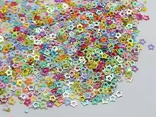 50Gram Mixed Color Hollow Star Sequins Loose Tiny 3mm Nail Art 
50Gram Mixed Color Hollow Star Sequins Loose Tiny 3mm Nail Art