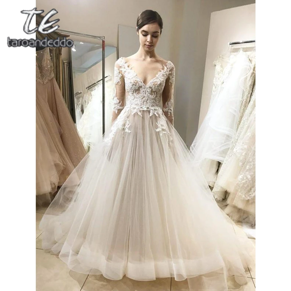 V Neck Tulle Wedding Dresses Long Sleeves Applique A Line Illusion Back Floor Length Sweep Train Bridal Dress Vestido De Noiva
V Neck Tulle Wedding Dresses Long Sleeves Applique A Line Illusion Back Floor Length Sweep Train Bridal Dress Vestido De Noiva