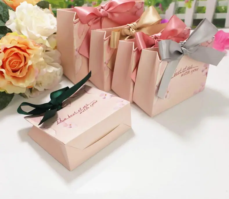 24 PCS New Gold Stamping Handbag Candy Box Wedding Sugar Bag High-grade Gift Return Paper Bag Bridal Shower Favors Packaging
24 PCS New Gold Stamping Handbag Candy Box Wedding Sugar Bag High-grade Gift Return Paper Bag Bridal Shower Favors Packaging