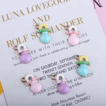 100pcs 13*19mm Handmade Diy jewelry gold color alloy enamel baby nipple pendant pacifier charms with crystal rhinestone CH0273
100pcs 13*19mm Handmade Diy jewelry gold color alloy enamel baby nipple pendant pacifier charms with crystal rhinestone CH0273