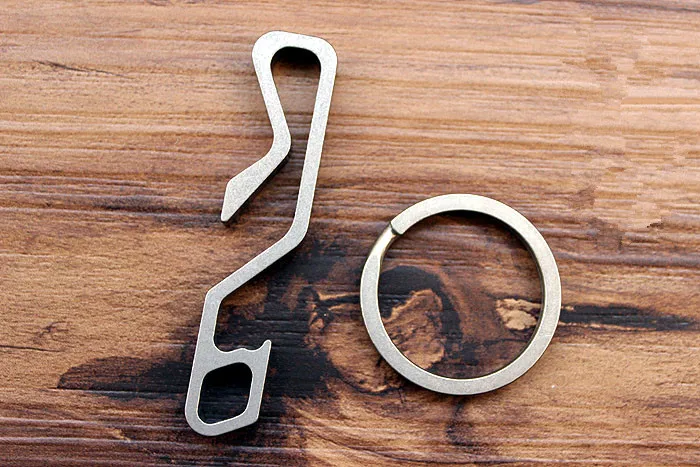 Bottle Opener Titanium Alloy Multi-function Key Ring Phone Bracket Corkscrew Quickly Hung Buckle Key Ring EDC Multi Tools
Bottle Opener Titanium Alloy Multi-function Key Ring Phone Bracket Corkscrew Quickly Hung Buckle Key Ring EDC Multi Tools