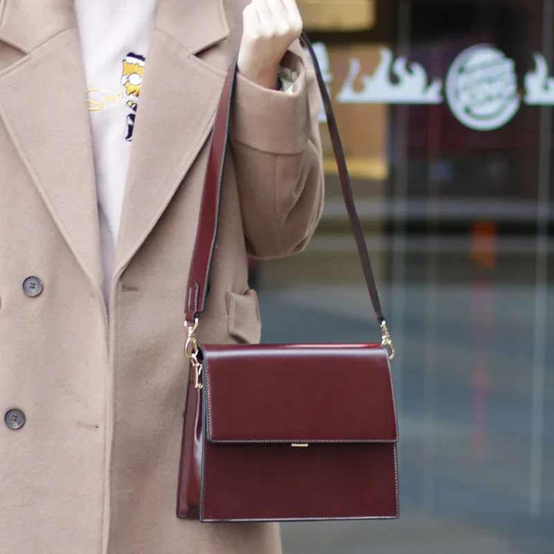 New fashion retro Wild shoulder strap stereo bag Simple pu skin square bag casual women leather solid color hand bag
New fashion retro Wild shoulder strap stereo bag Simple pu skin square bag casual women leather solid color hand bag