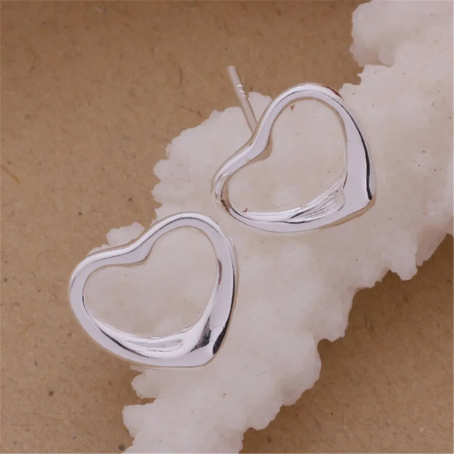 E099 Hot new factory direct silver color jewelry fashion charm women simple caring earrings free shipping
E099 Hot new factory direct silver color jewelry fashion charm women simple caring earrings free shipping
