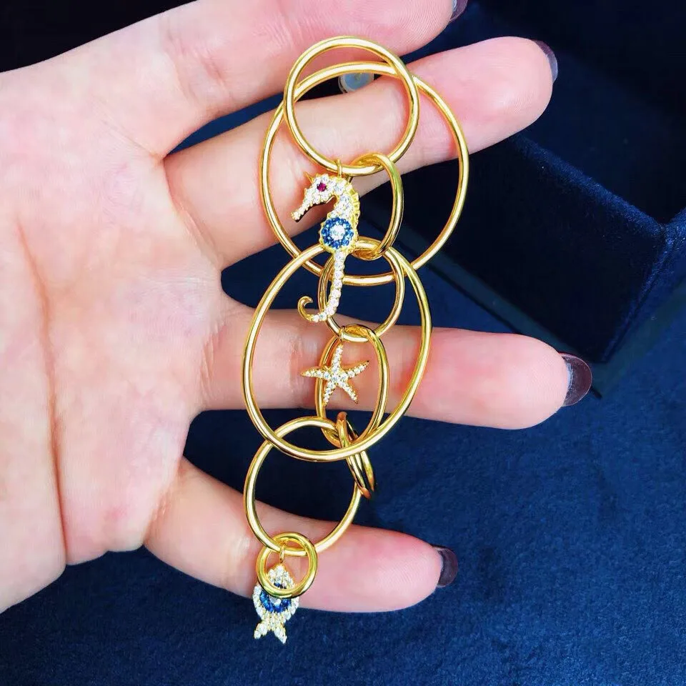 SLJELY Real 925 Sterling Silver Mono Yellow Gold Color Seahorse Fish Multi Hoops Circles Long Drop Earring Women Monaco Jewelry
SLJELY Real 925 Sterling Silver Mono Yellow Gold Color Seahorse Fish Multi Hoops Circles Long Drop Earring Women Monaco Jewelry