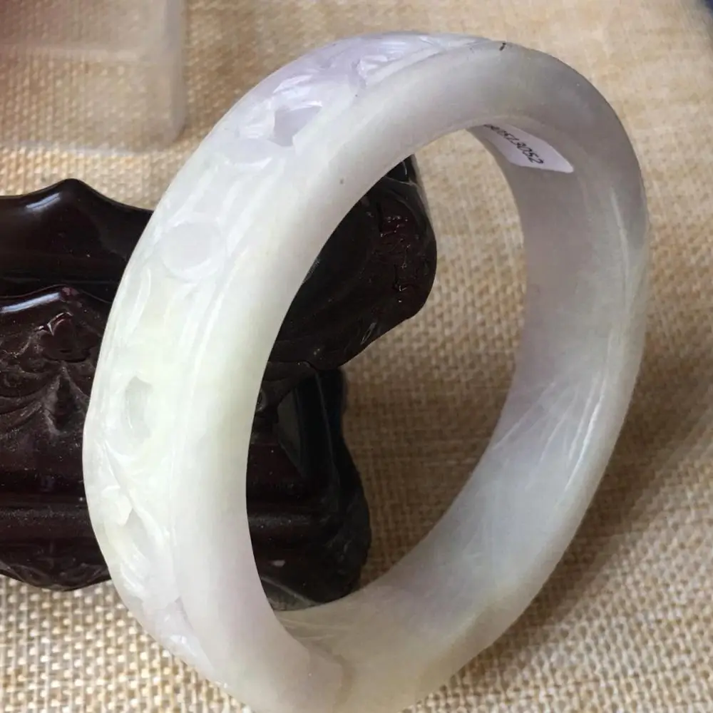 63mm Certified (Grade A) Natural stoneite hand-carved flower design bracelet 3052
63mm Certified (Grade A) Natural stoneite hand-carved flower design bracelet 3052