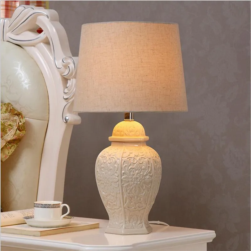 High End Europe Brief Handmade White Ceramic Fabric Led E27 Table Lamp for Wedding Decor Living Room Bedroom Study 1455c
High End Europe Brief Handmade White Ceramic Fabric Led E27 Table Lamp for Wedding Decor Living Room Bedroom Study 1455c