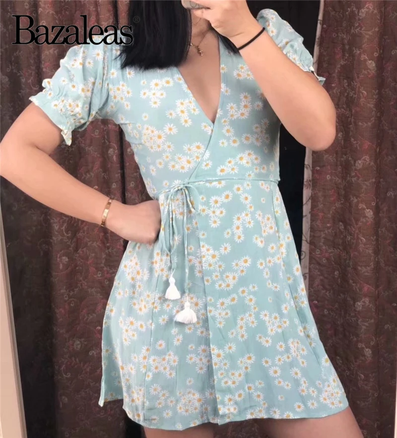 Bazaleas high quality Fashion Tassel tie side women dress Chic daisy Print wrap dress V Neck party dress Holiday Vintage vestido
Bazaleas high quality Fashion Tassel tie side women dress Chic daisy Print wrap dress V Neck party dress Holiday Vintage vestido