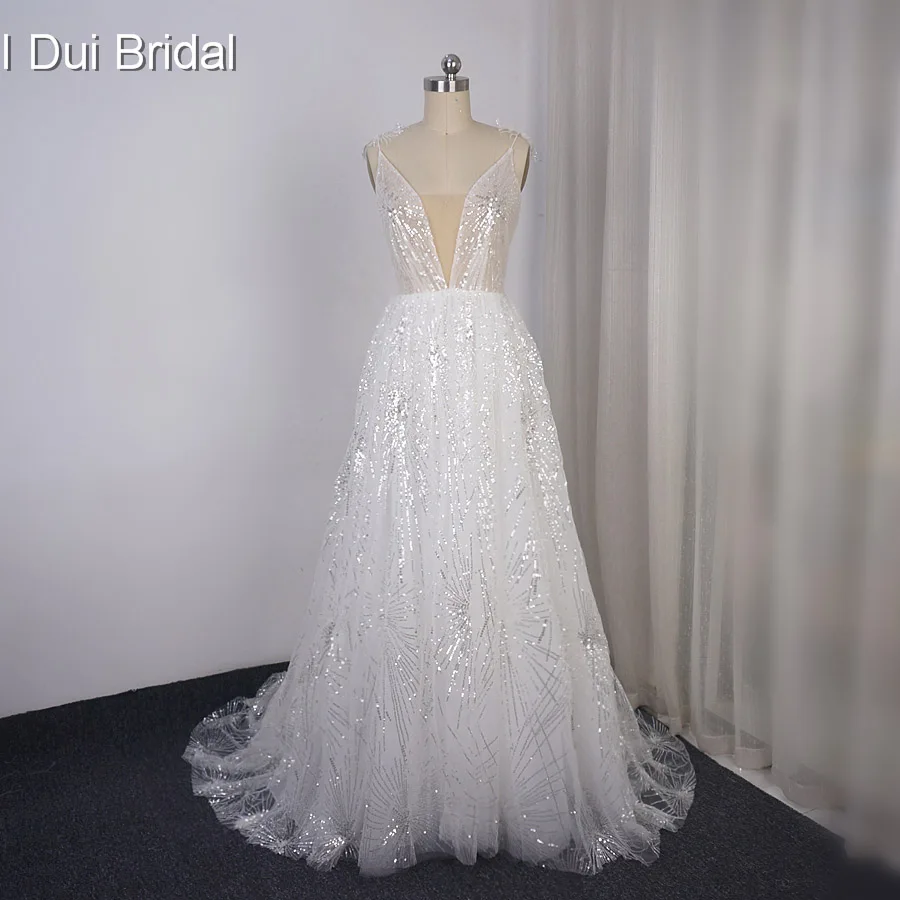 Sequin Shinny Starry Wedding Dress Spaghetti Strap A Line Bridal Gown Illusion Corset 2019 New
Sequin Shinny Starry Wedding Dress Spaghetti Strap A Line Bridal Gown Illusion Corset 2019 New