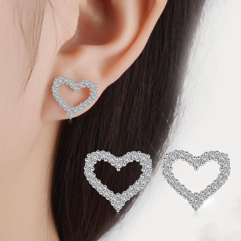925 Sterling Silver Hollow-out Crystal Love Heart Stud Earrings with Clear CZ Female Brincos for Woman Fine Jewelry
925 Sterling Silver Hollow-out Crystal Love Heart Stud Earrings with Clear CZ Female Brincos for Woman Fine Jewelry