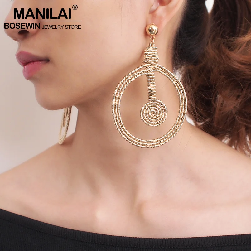 MANILAI Bohemian Alloy Spiral Statement Earrings Women Vintage Hollow Out Round Metal Dangle Earrings Fashion Jewelry
MANILAI Bohemian Alloy Spiral Statement Earrings Women Vintage Hollow Out Round Metal Dangle Earrings Fashion Jewelry