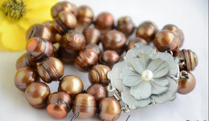 FREE shipping>>>>3strands 14mm almost round coffee screw thread freshwater pearl bracelet 8inch
FREE shipping>>>>3strands 14mm almost round coffee screw thread freshwater pearl bracelet 8inch