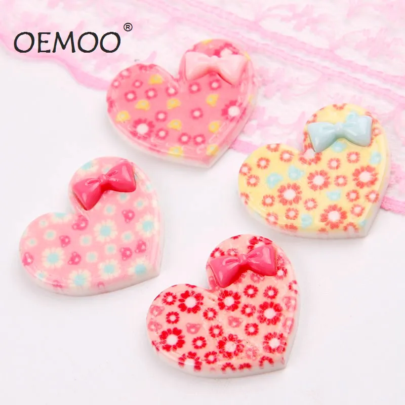 50pcs heart shape with bow resin cabochon 25*29mmflat back cabochon for girl phone art
50pcs heart shape with bow resin cabochon 25*29mmflat back cabochon for girl phone art