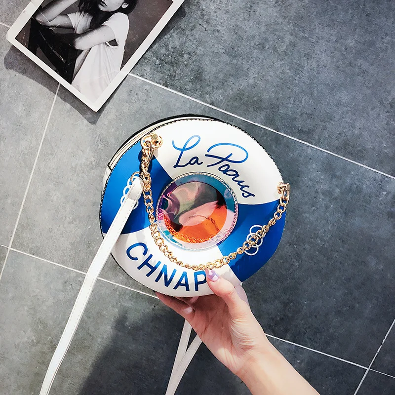 new European and American fashion small round bag chain handbag a hundred with a single shoulder slanted small bag
new European and American fashion small round bag chain handbag a hundred with a single shoulder slanted small bag