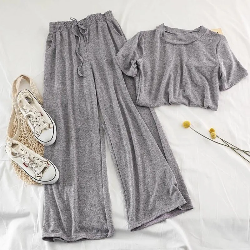 2019 Autumn Women's Soild Knitted 2 Piece Set Retro Loose Short Sleeve T-shirt High Waist Wide Leg Pants Set
2019 Autumn Women's Soild Knitted 2 Piece Set Retro Loose Short Sleeve T-shirt High Waist Wide Leg Pants Set