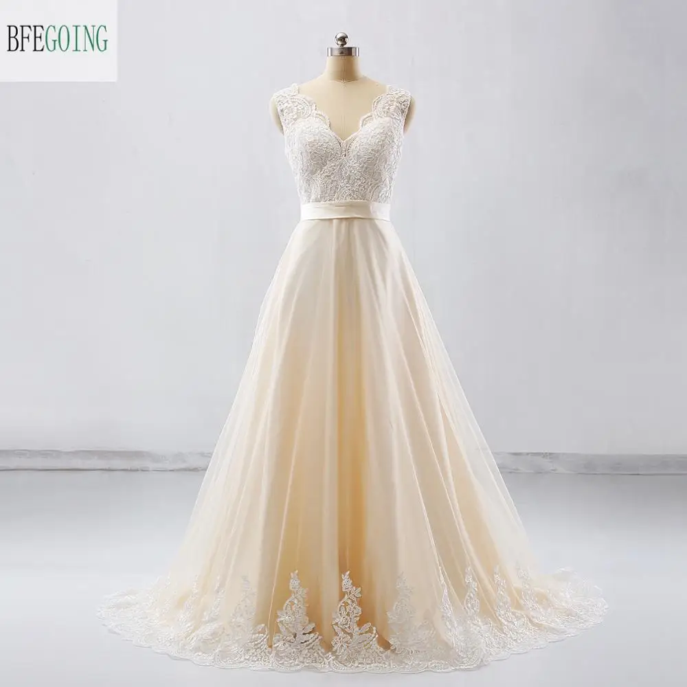 Champagne Tulle Lace Satin A-line Wedding Dress V-Neck Floor -Length Chapel Train Real/Original Photos Custom made
Champagne Tulle Lace Satin A-line Wedding Dress V-Neck Floor -Length Chapel Train Real/Original Photos Custom made