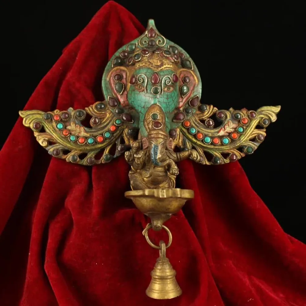 Tibetan temples old copper handmade inlaid gem Painted outline in gold Elephant god Oil lamp Wall hanging
Tibetan temples old copper handmade inlaid gem Painted outline in gold Elephant god Oil lamp Wall hanging