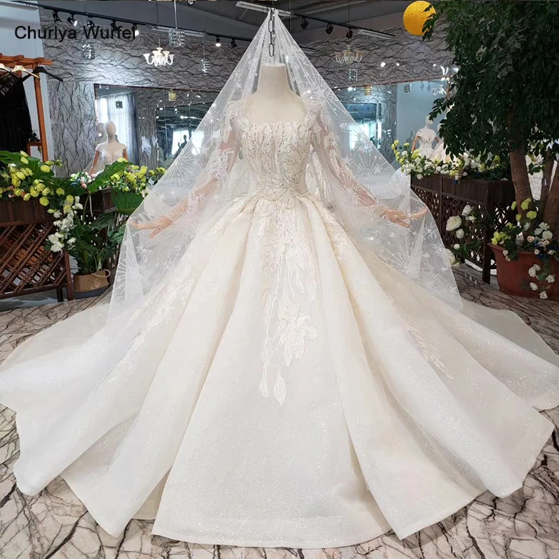 HTL331 Ball gown Wedding Dress with wedding veil square neck long sleeve button handmade bridal wedding gown with long train
HTL331 Ball gown Wedding Dress with wedding veil square neck long sleeve button handmade bridal wedding gown with long train