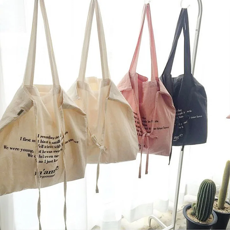 Strap Cloth Bow DIY Letter Canvas Bag New Women Shoulder Bag Creative Tote Pink Tote Portable Shopping Bag
Strap Cloth Bow DIY Letter Canvas Bag New Women Shoulder Bag Creative Tote Pink Tote Portable Shopping Bag